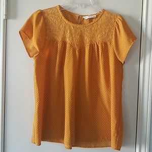 Mustard yellow with black polka dots top